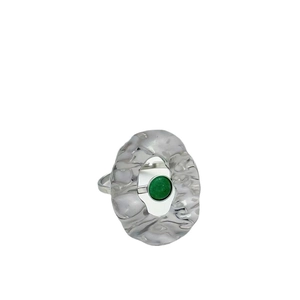 Silver stainless steel ring with hammered texture and a green gemstone on white background