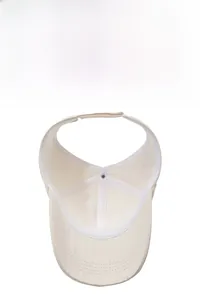 Detail of adjustable velcro strap and inner sweatband on a beige open top visor hat