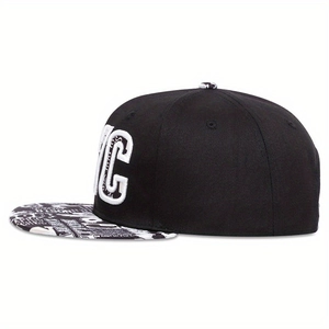 Black snapback hat with white NYC embroidery and newspaper print brim for street hip hop style