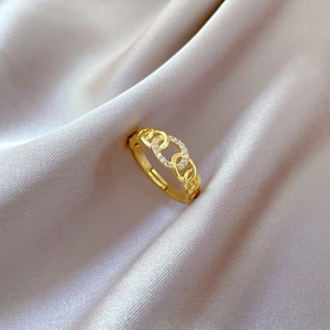 Luxury 18K gold-plated chain ring with sparkling zircon pavé on champagne silk