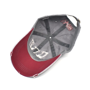 Inside view of distressed cotton baseball cap showing 6-panel structure and metal buckle