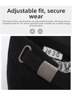 Detail of adjustable cotton baseball cap featuring silver metal buckle and fabric strap