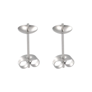 Close-up of polished stainless steel stud earring components with pins and backings