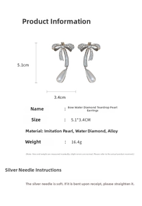 Detail of silver bow earrings with zircon and drop pearl showing dimensions 5.1x3.4cm