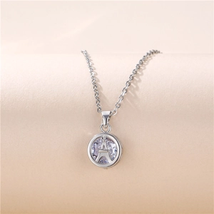 Silver Eiffel Tower circular pendant necklace with sparkling cubic zirconia stones