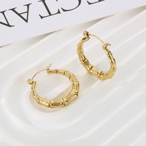 Elegant gold U-shaped bamboo textured hoop earrings in polished stainless steel for women