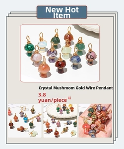 Detailed close-up of handmade wire-wrapped crystal mushroom pendants in varied gemstones