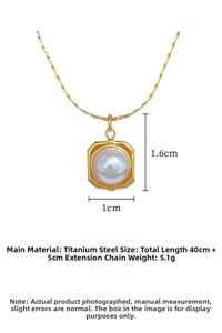 Detailed close-up of a gold square titanium steel pendant necklace with a white pearl inlay