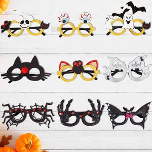 Variety set of 9 Halloween party glasses with felt motifs and glitter on white wood background