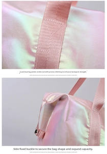 Detail of reinforced stitching and side metal buckle on pink holographic travel bag