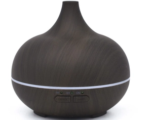 Detail view of dark wood grain ultrasonic diffuser with 1H 3H and ON mist timer buttons