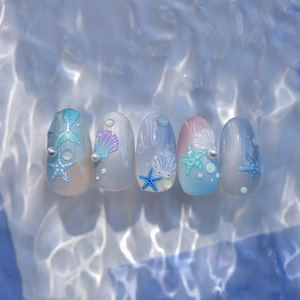 Détails d'autocollants pour ongles océan avec étoiles de mer 3D et textures coquillages