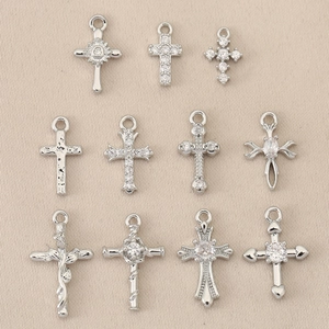 Set of 12 vintage baroque style cross pendants in polished silver metal for DIY jewelry
