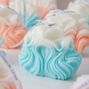 Creative wavy mountain scented candles in blue and orange gradient for home decor