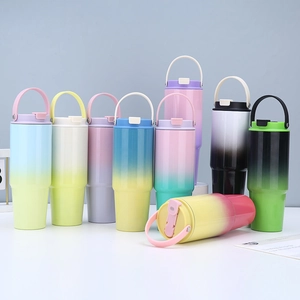 Detailed view of 30oz gradient stainless steel tumblers with handles and straws