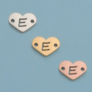 Mirror polished 12mm stainless steel heart pendants with letter E cutouts in three colors