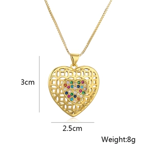 Detailed view of hollow heart pendant with gemstone and dimensions 3cm x 2.5cm