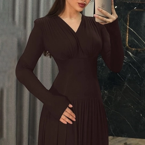 Detailed view of dark brown V-neck maxi dress with pleated skirt and slim waist design