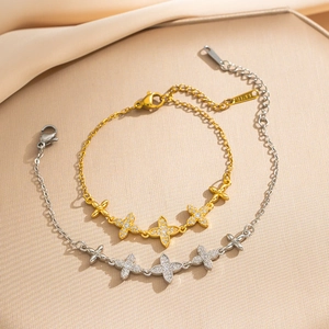 Bracelets trèfle élégants en acier inoxydable or et argent avec incrustation de zircon