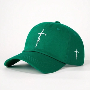 Dark green cotton baseball cap featuring white 'faith' cross embroidery on the front