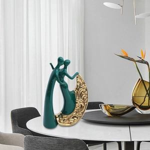 Elegant emerald and gold resin couple sculpture for modern European home decor