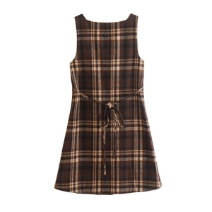 Vintage brown plaid sleeveless dress with back tie design on a white background