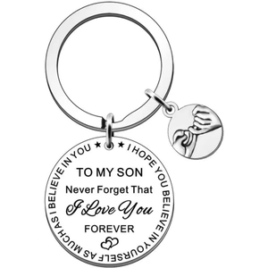 Macro view of engraved stainless steel keychain with sentimental text to son