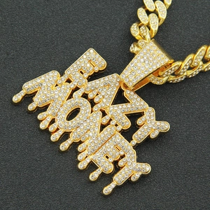 Iced out gold MONEY pendant necklace with dripping letters and sparkling Cuban chain
