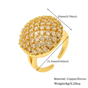 Detail view of adjustable copper ring featuring a large oval pave zircon centerpiece