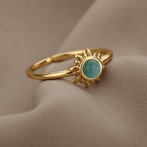Adjustable golden sun opal ring for women with round turquoise center stone