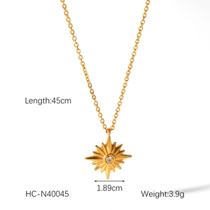 Detail shot of a golden star pendant necklace with dimensions 45cm length and 1.89cm width