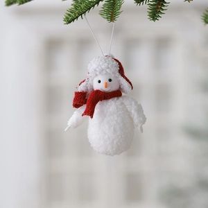 Plush Christmas snowman pendant hanging on pine branch with red scarf and hat decor