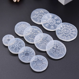 Set of 11 translucent silicone molds with diverse snowflake designs for DIY crafts