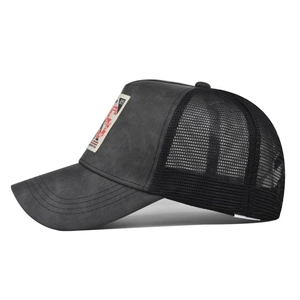 Detail of grey trucker cap featuring mesh back and rectangular lightning bolt patch