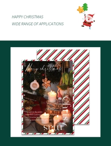 Detail showing Christmas kraft wrapping paper with festive Santa Claus greeting card