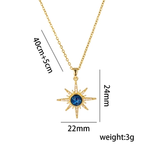 Gold starburst planet necklace with blue gemstone and dimensions 40cm+5cm 3g