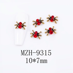 Detail of red rhinestone spider nail art charms in gold alloy with 10x7mm dimensions