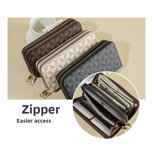 Detailed view of the double zipper wallet interior with multi-card slots and compartments