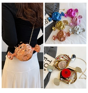 Metallic candy-shaped hard shell clutch bag shown with chain strap and interior storage