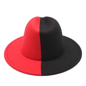 Detail of red and black split-color felt jazz hat with reinforced edge stitching
