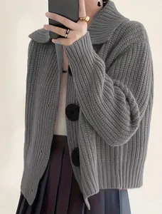 Chic dark grey oversized knit cardigan with large lapels and chunky black buttons