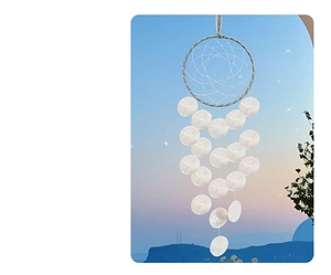Handmade dreamcatcher wind chime featuring natural white shells and woven silver ring