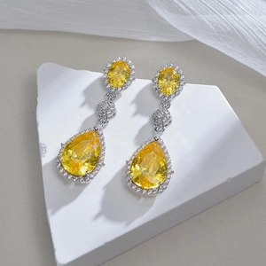 Luxurious yellow teardrop gemstone earrings in polished 316 stainless steel with zircons