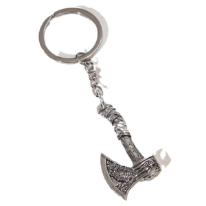 Vintage silver finish metal axe keychain with detailed engravings on a white background