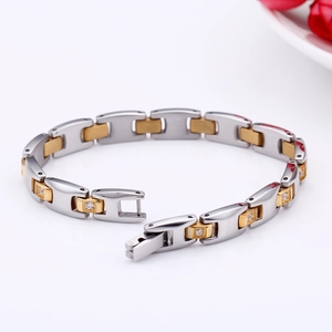 Modern two-tone stainless steel link bracelet with zircons on a white background