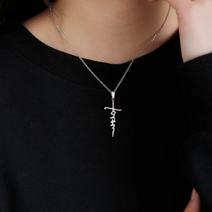 Polished stainless steel faith cross pendant necklace for women on a silver chain
