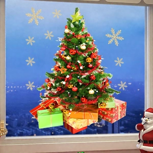 Detail of Christmas tree window stickers with colorful gift boxes and golden snowflakes