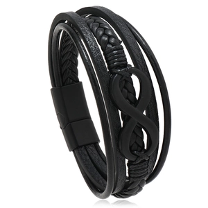 Detail of multi-layer black leather bracelet with infinity symbol and magnetic clasp