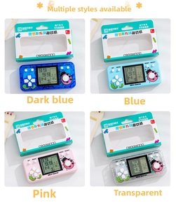 Retro handheld Tetris game console set in blue, pink and clear colors with retail packaging