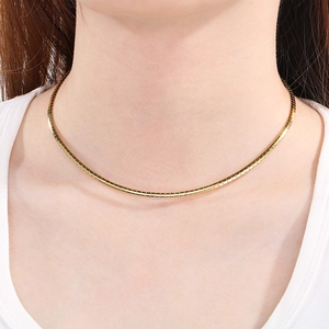 Minimalist 18K gold plated stainless steel snake chain choker on model